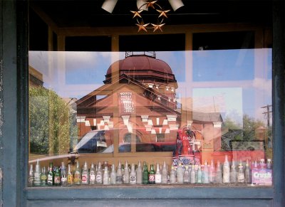 Library reflection and bottles, Lockhart, Texas