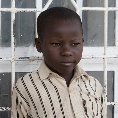 Boy in front of gasstation