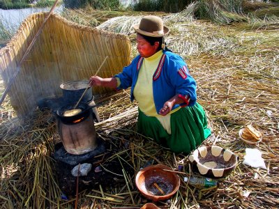 Grandma Cooks Breakfast , Uros Floating Islands Of Titicaca