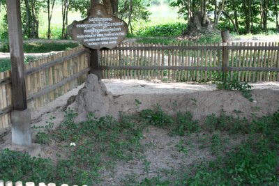 The mass grave described above (where some of the 3 million of Pol Pot's victims were murdered).