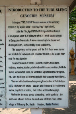 Sign describing Tuol Sleng Prison (a former school) where Pol Pot tortured political prisoners.