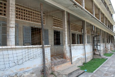 View of the outside of some of Tuol Sleng Prison cells.