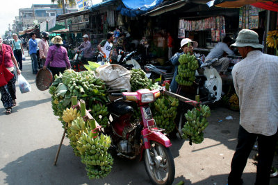 A moped stacked with bananas at the Russian Market.