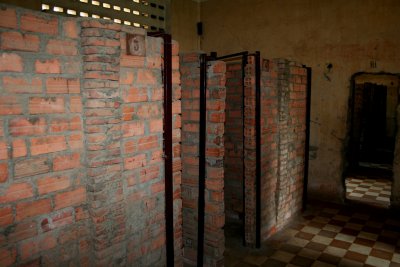 Interior view of the Tuol Sleng Prison and cell entrances.