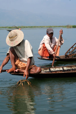 The fishermen fish where they see small bubbles or under water movements on the the lake.