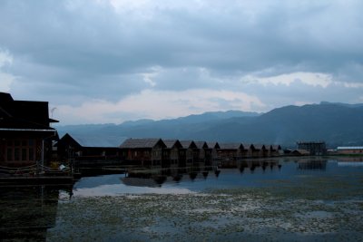 View of individual cabins at dusk at the Paradise Inle Resort.