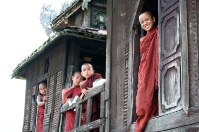 Young monks looking out of the Nyaung Shwe Monastery.