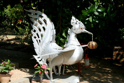 Nice bird sculpture in the garden of the restaurant.