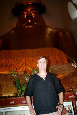 Me looking dwarfed by the Buddha inside the Manuha Temple.