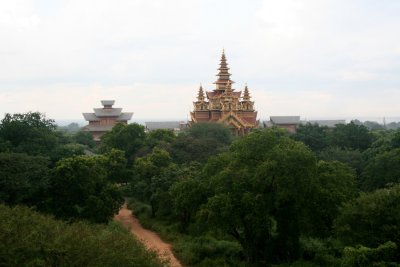 Two modern-looking temples in the Bagan landscape.