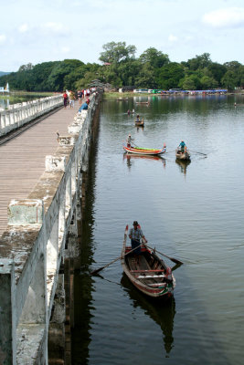 Some of the many ferry boats that are on Taungthaman Lake.