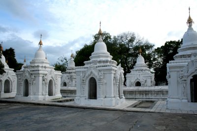 Each shrine contains a marble slab, inscribed with the Pali script of a portion the Tipitaka (Buddhisms sacred text).