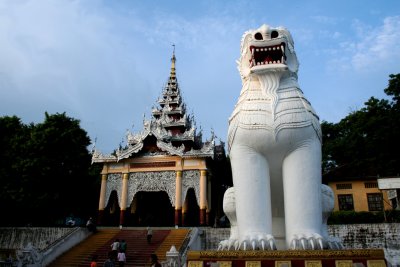 The lion sculptures and the steps form the portal to Mandalay Hill.