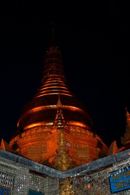 The golden stupa of the pogoda as it reflected in the evening light.