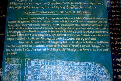 According to this sign, there are 108 marks on the Buddha's feet representing different worlds.