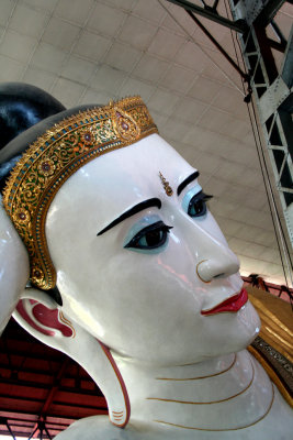 Closeup of the Reclining Buddha's flawless porcelain head.