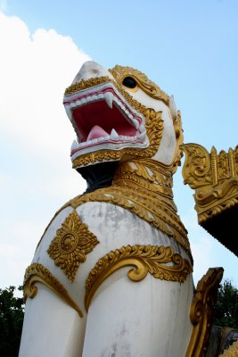 Closeup of one of  the guardian lions in front of the Kyauktawgyi Pagoda.