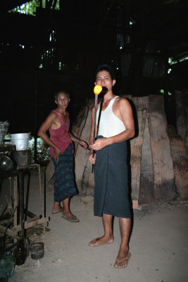 This is a traditional glass factory in Yangon where glass is still blown.