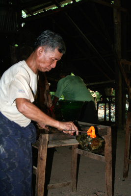 He shaped the hot molten glass into the shape of a handle.