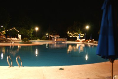 The Dusit Inya Resort Lake Hotel's pool at night.