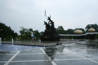 The Tugu Negara (National Monument) on a rainy day in Kuala Lumpur.