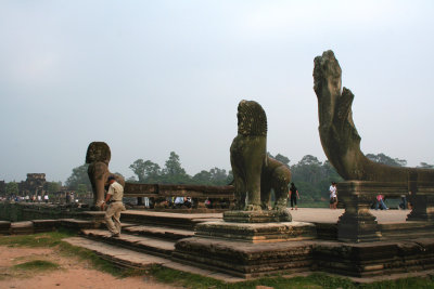 Lion statues at the entrance of the Angkor Wat Temple.