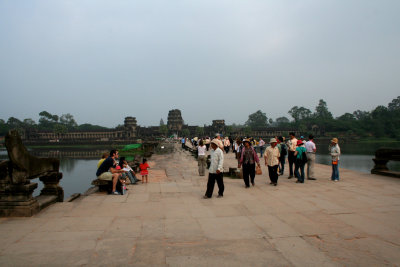 View of the entrance causeway that crosses the moat and leads towards the temple.