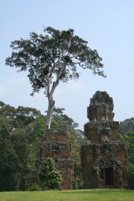 Two ancient Angkor buildings side by side.