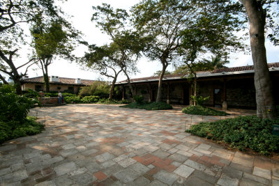 Nice tile walkway with buildings in the background.