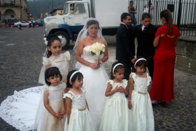 The bride with some of the younger members of the wedding party.