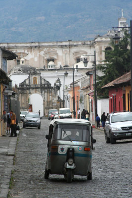 This 3-wheeled taxi was coming my way.  They are usually red and are a common sight in Guatemala.