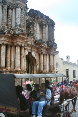 Tourist going by El Carmen in a horse and buggy.