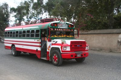 Antigua's brightly painted buses are called chicken buses because there is a good chance you may ride with one!
