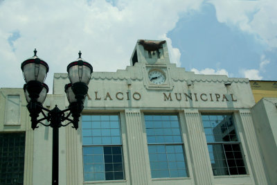 The Municipal Palace with a beautiful street lamp in the foreground.