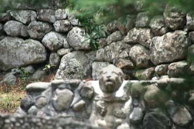 Notice the lion carving in the stone wall.