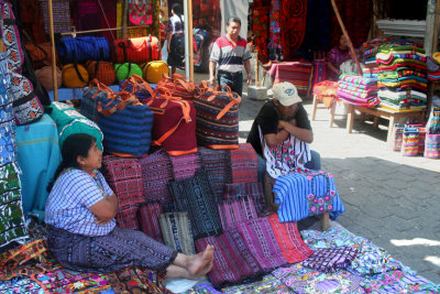 A typical stand where many of the native Guatemalan textiles are sold.