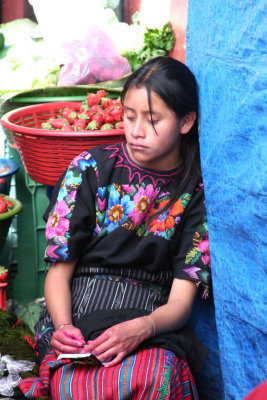 A young girl with a look of total boredom on her face!