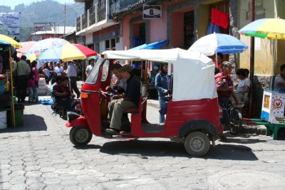 These three-wheeled taxis can be seen all over Guatemala.
