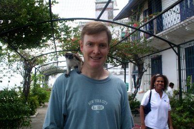 A photo stop of me with a monkey (belonging to a vendor) on my shoulder.  My tour guide is behind me.