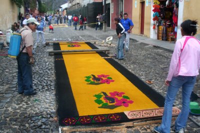 This carpet (alfombra) was being prepared in the morning for the upcoming procession that afternoon.