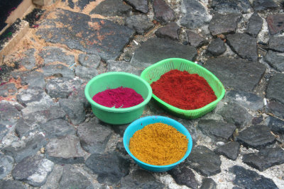 Colored (dyed) sawdust is most commonly used to make the carpets.