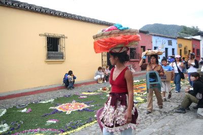 This woman was balancing a basket on her head.