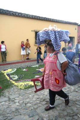 This woman had a load on her head with a table cloth.