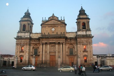 View of the Metropolitan Cathedral at dusk in Plaza Mayor.