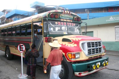 Panajachel's brightly painted buses are called chicken buses because there is a good chance you may ride with one!