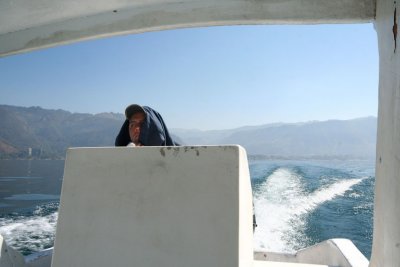 Our boat driver who was wrapped up to stay warm.