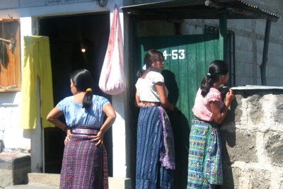 On the hill, I passed by these three attractive Guatemalan girls.