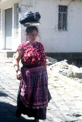 Walking down the hill towards me was this Indian woman balancing a load on her head.