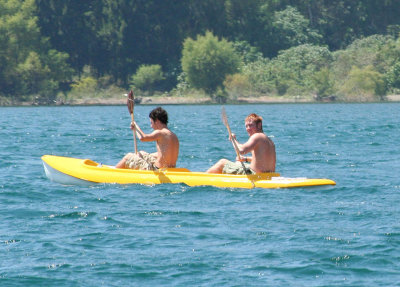 These 2 boys passed by in a kayak.  As pale as they were, I hope they used sun block!
