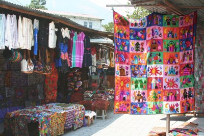 There were many bright textiles and tourist items on display in this shop.